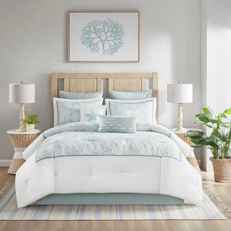 Cozy bedroom with decorative pillows and bedding.
