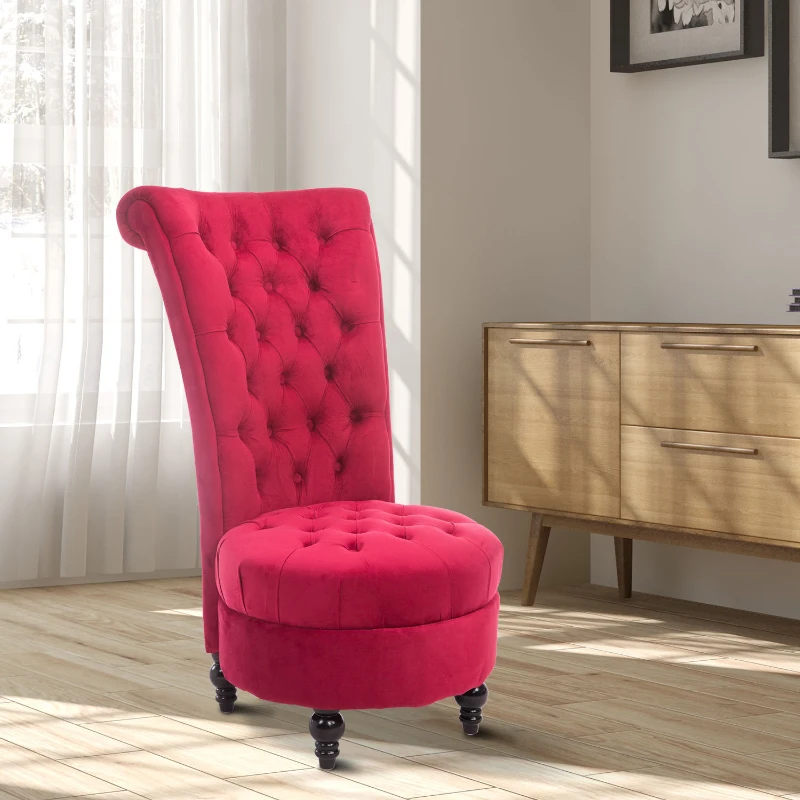 Red tufted high back chair with curved design in bright room.