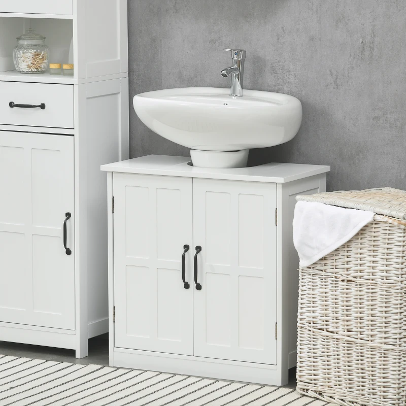 White bathroom vanity with a sink, storage cabinet, and laundry basket on a striped rug.
