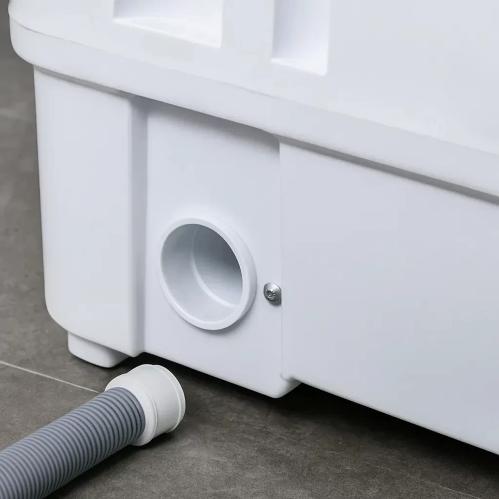 Close-up of washing machine hose connection with nozzle