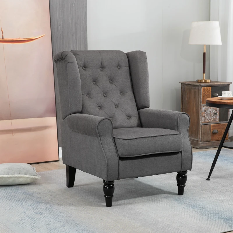 Grey armchair with rolled arms in modern living room.