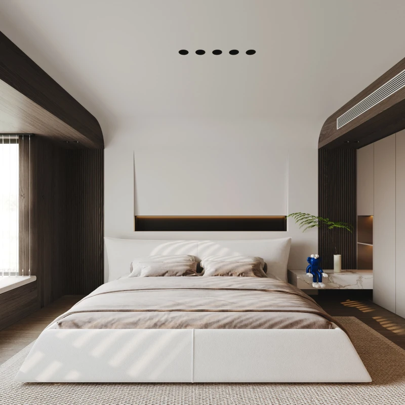 Upholstered bed frame for a luxurious, polished look with neutral tones and rich textures.
