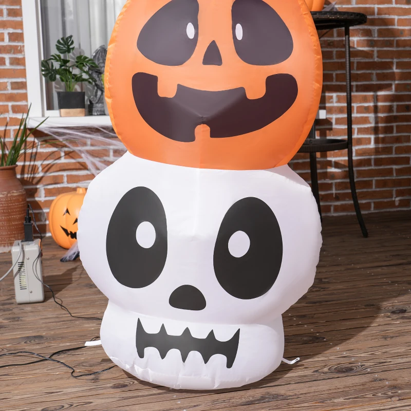 Inflatable Halloween decoration plugged into outdoor power supply.