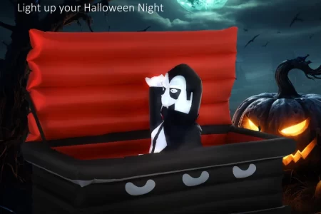 Inflatable vampire rising from red coffin with glowing Halloween pumpkin and full moon background.