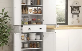 White cabinet with organized shelves of food jars and bowls