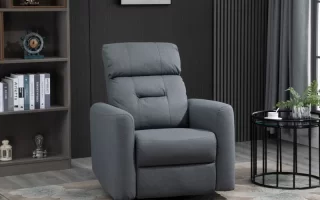 Gray recliner chair in bright room beside side table