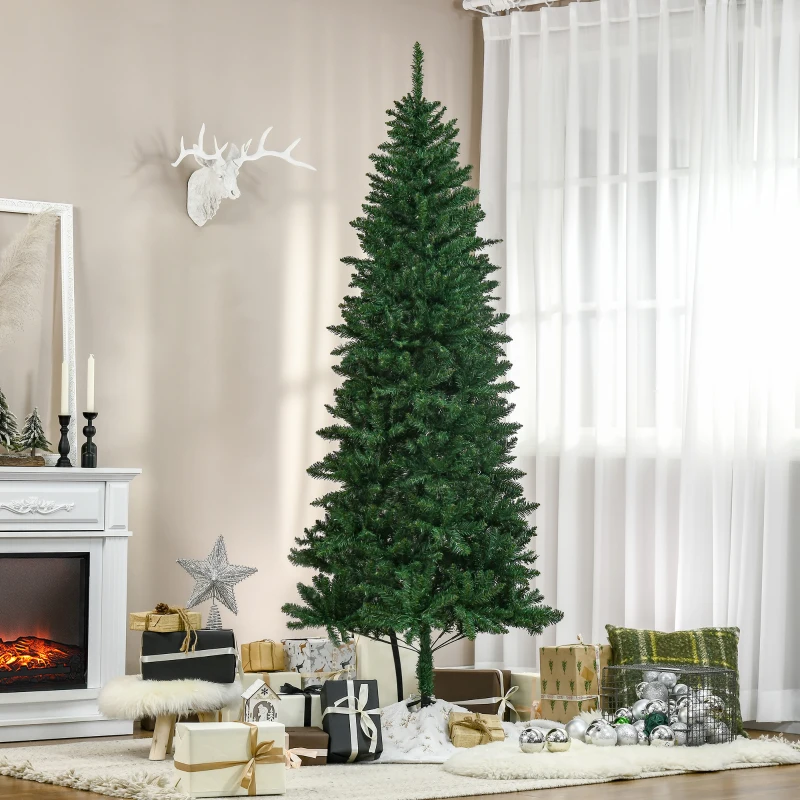 Green artificial Christmas tree decorated beside fireplace and wrapped gifts.