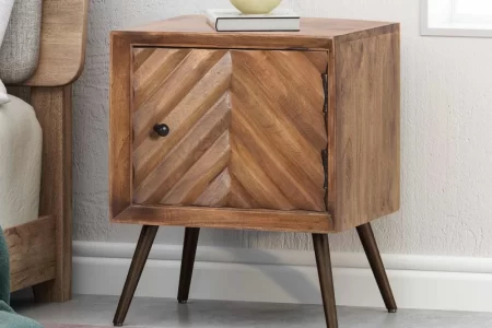 Wooden cabinet with chevron door and angled metal legs.