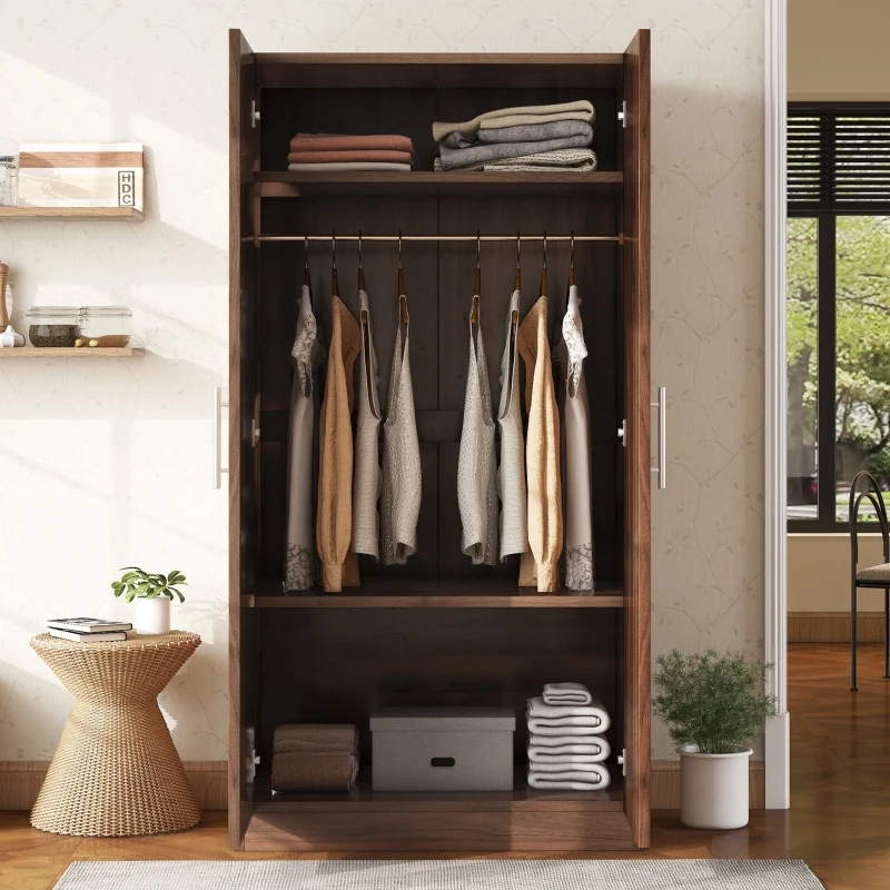Clothes neatly hung inside wooden wardrobe with shelves

