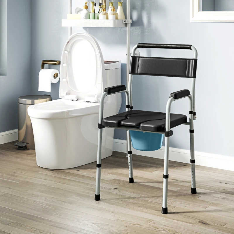 Adjustable commode chair positioned in bathroom near toilet.