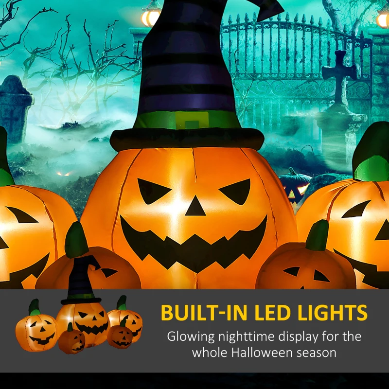 Cluster of glowing jack-o’-lantern inflatables with witch hats.