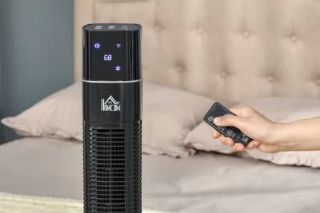 Tower fan assembly with remote and base cover parts