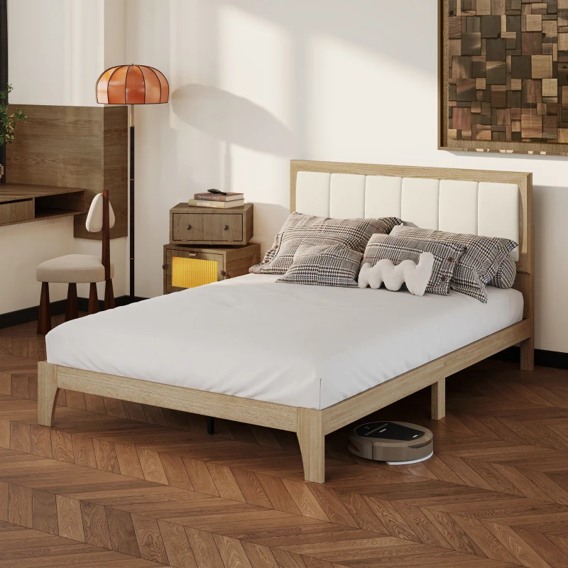 Modern wooden bed with white mattress in a cozy bedroom setting.