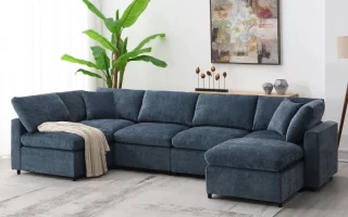 Blue fabric sectional sofa with chaise in bright living room