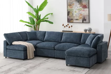 Blue fabric sectional sofa with chaise in bright living room