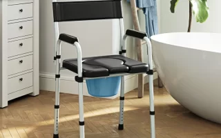 Commode chair with padded seat and bucket placed in bathroom.