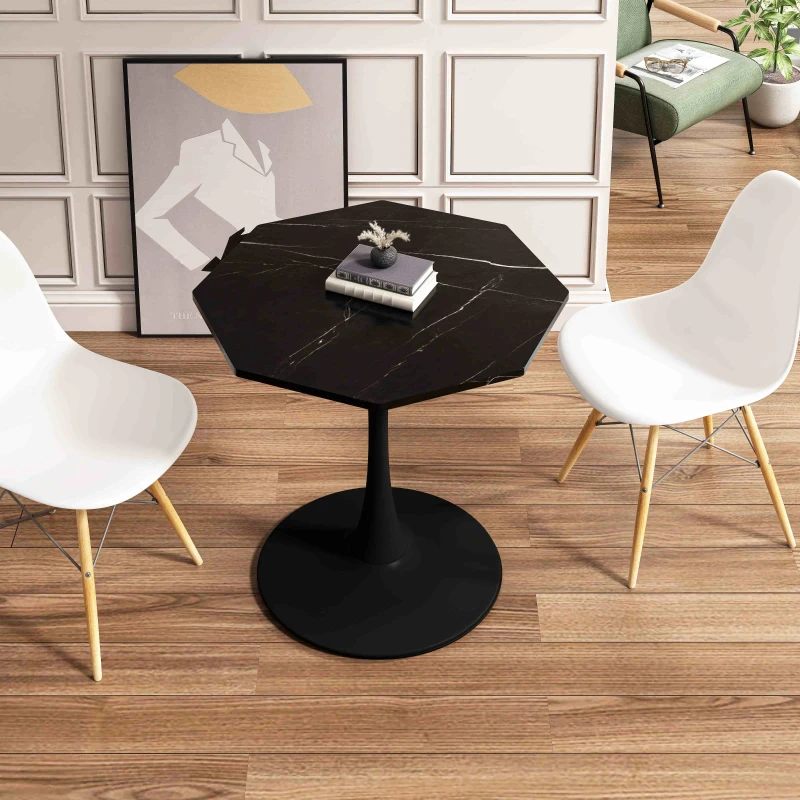 Black octagonal coffee table with books and plant