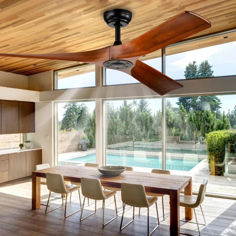 Contemporary silver ceiling fan with integrated LED light brightening an open-concept living and dining room.
