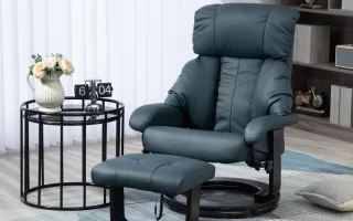 Dark blue recliner chair with ottoman beside round side table