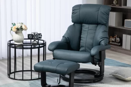 Dark blue recliner chair with ottoman beside round side table