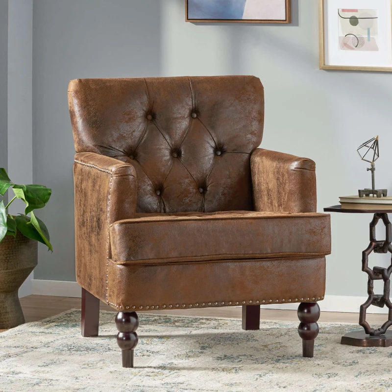 Brown leather accent chair with plush cushion in contemporary room.