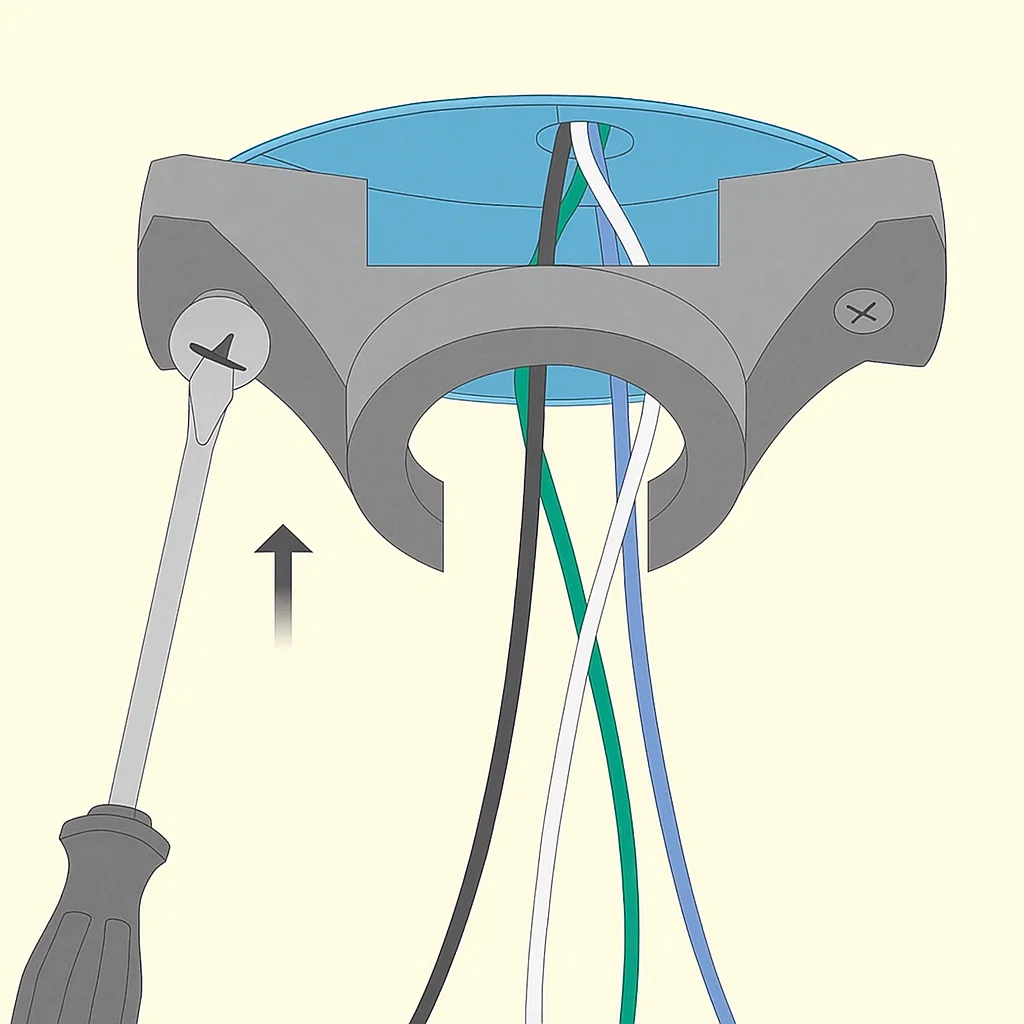 Electrician securing ceiling fan mounting bracket with visible color-coded wires