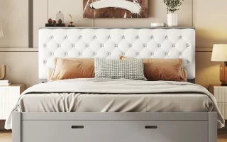 White tufted headboard bed with gray storage drawer