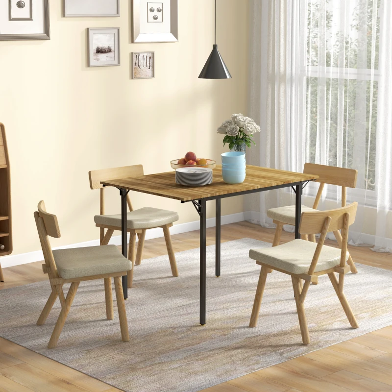 Cozy dining area with four chairs and light-wood table near window
