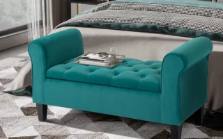 Teal tufted ottoman bench styled in modern bedroom interior