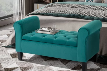 Teal tufted ottoman bench styled in modern bedroom interior