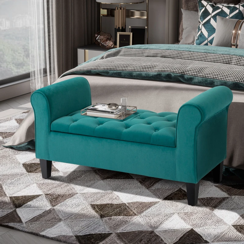Teal tufted ottoman bench styled in modern bedroom interior
