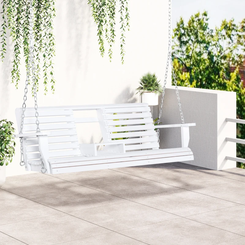 White hanging porch swing on patio with greenery above.
