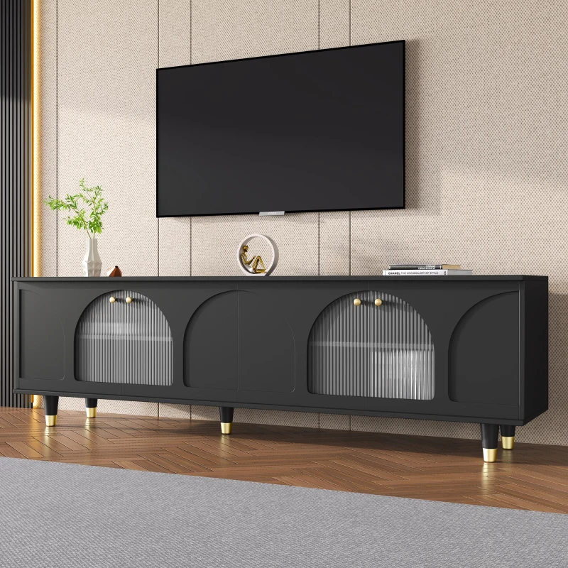 Stylish black TV stand with glass doors and golden handles.