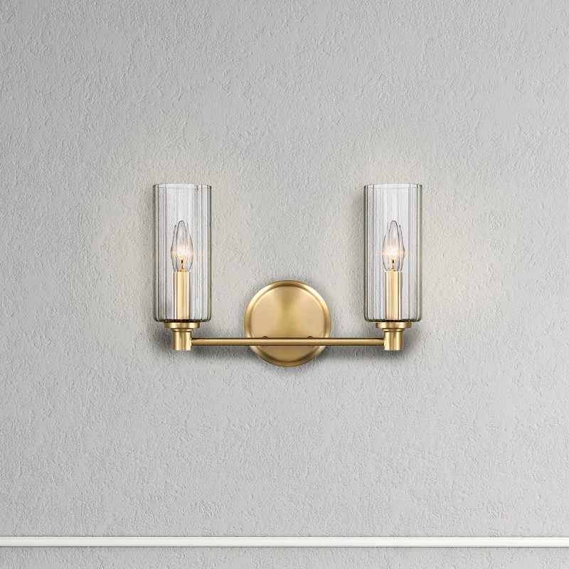 Double wall light with clear glass shades on gold base