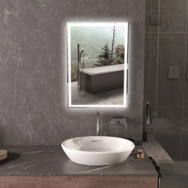 Modern bathroom with rectangular LED mirror above vessel sink.