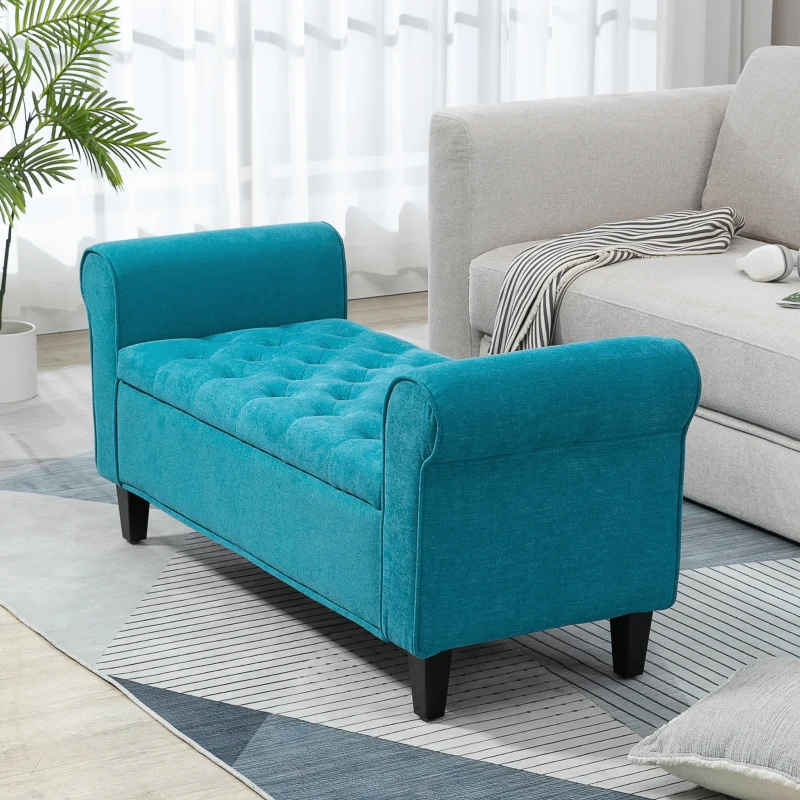 Teal tufted ottoman bench with rolled arms in living room
