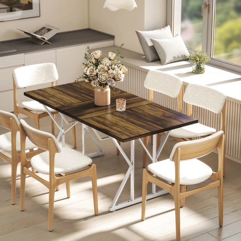 Bright dining room with six chairs around dark extendable wood table