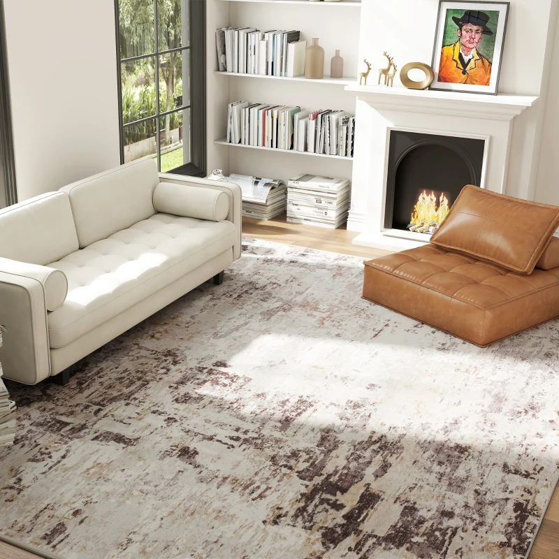 Contemporary living space with tan leather lounger and abstract beige rug.