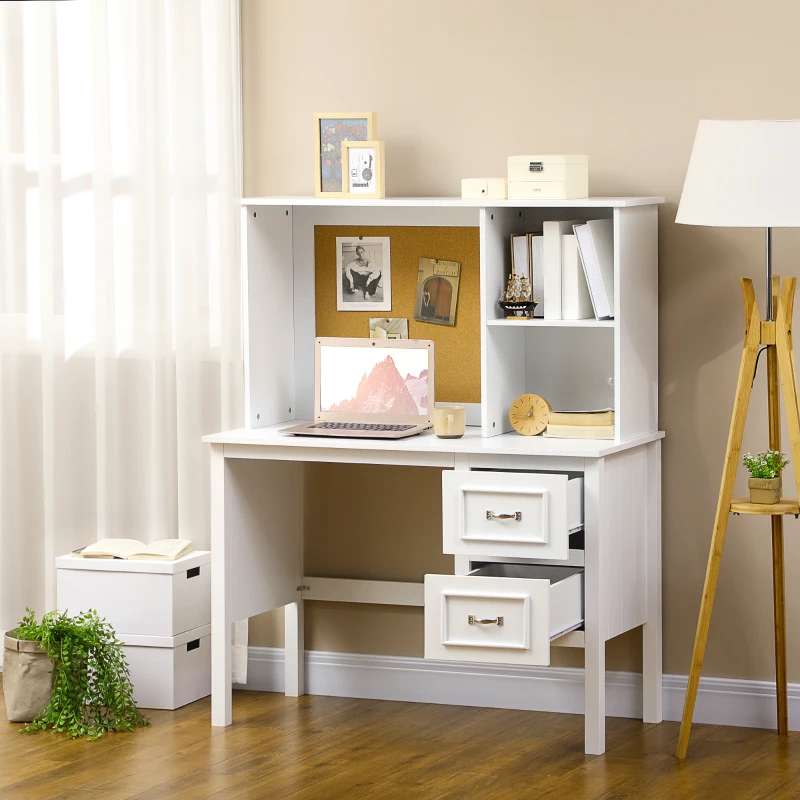 White desk with drawers, cork board, and storage shelves
