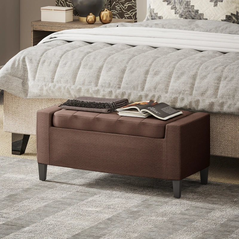 Brown linen ottoman bench placed at foot of bed

