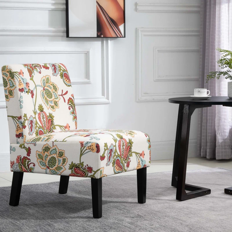 Floral patterned accent chair beside small black side table