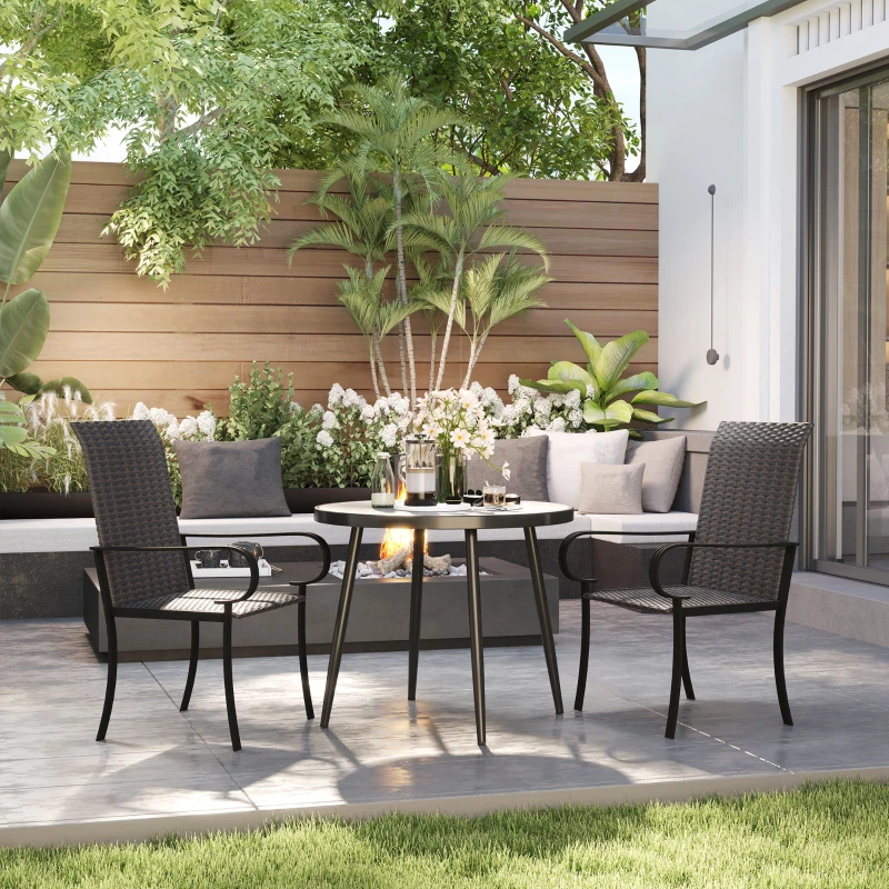 Patio dining set with black wicker chairs and round table
