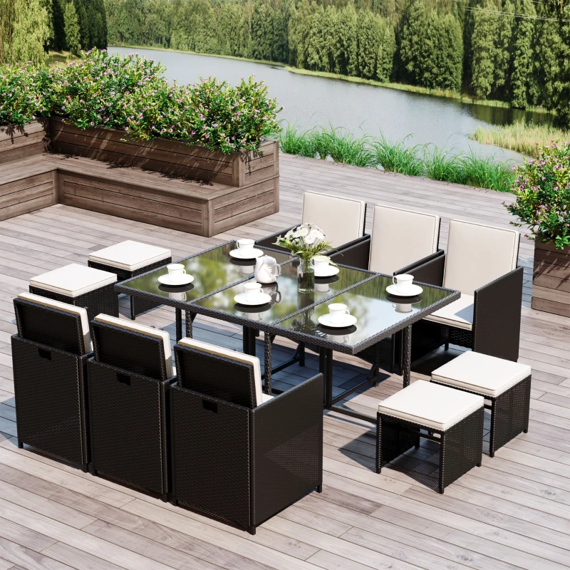 Large black wicker patio dining set with cushioned chairs.