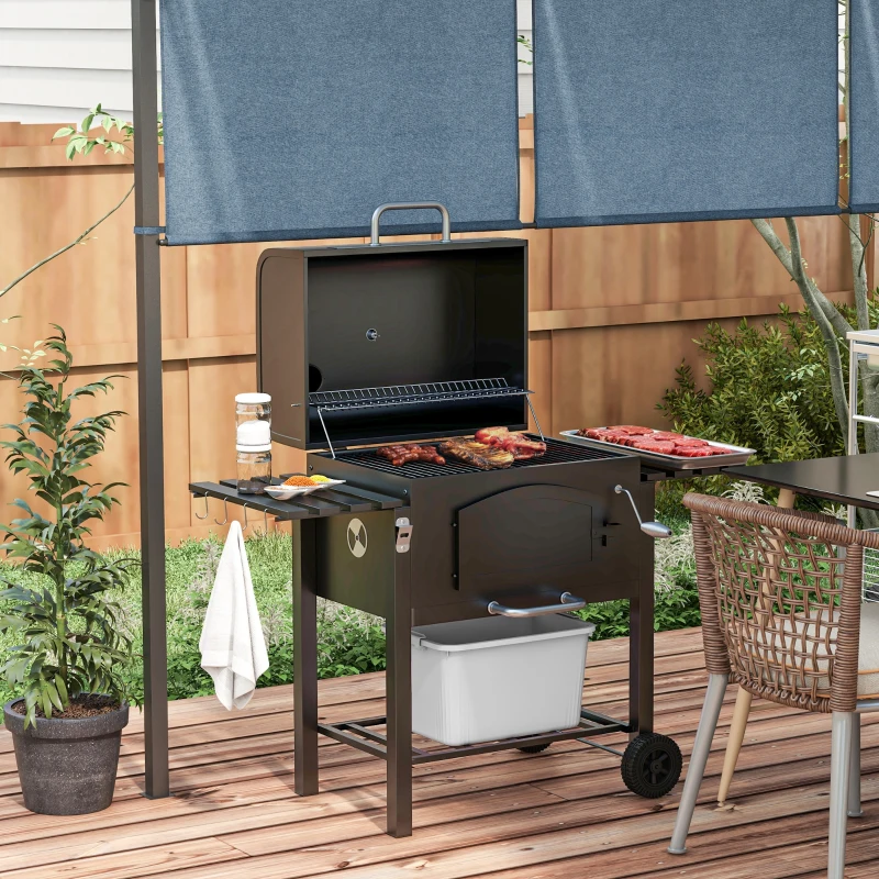 Outdoor barrel grill with side tables and cooking skewers.