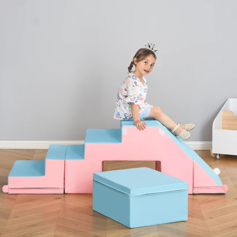 Girl sitting on pink and blue foam climbing ramp