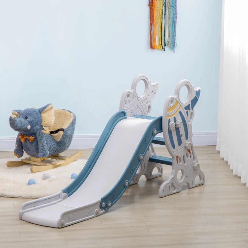 Blue and white toddler slide in cozy nursery corner.