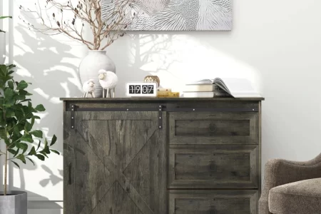 Rustic sideboard with decor items, books, and wall art.