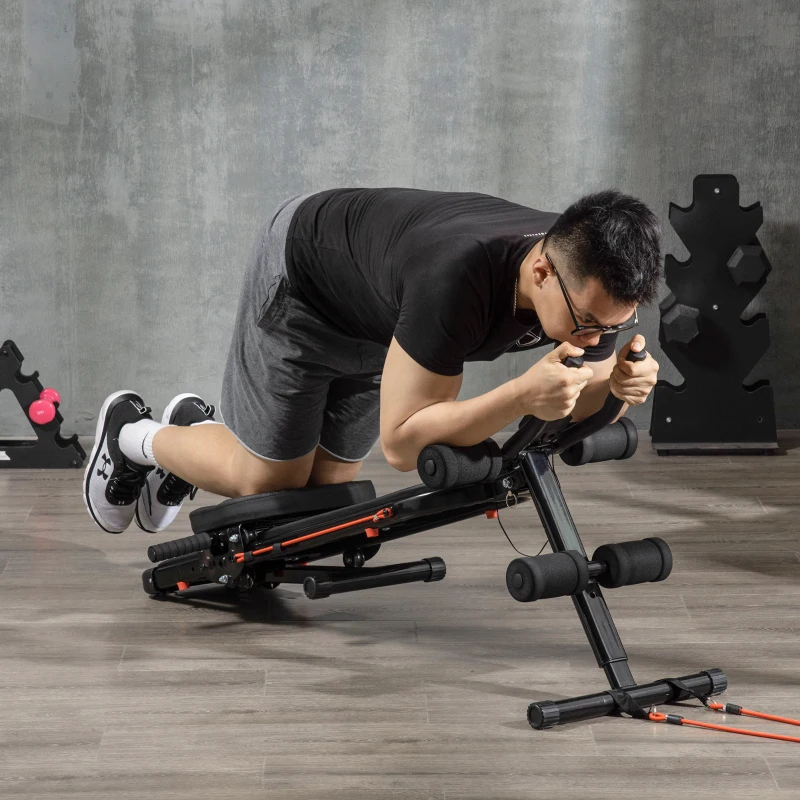 Man exercising on foldable ab workout bench for core training