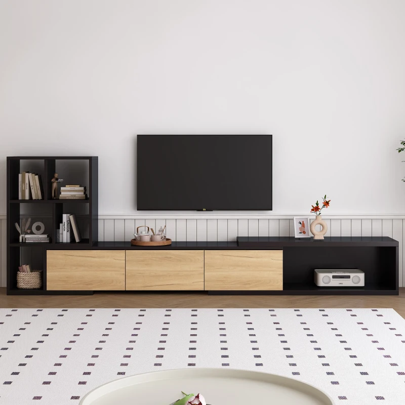 Black and wood finish extendable TV stand with open shelving.