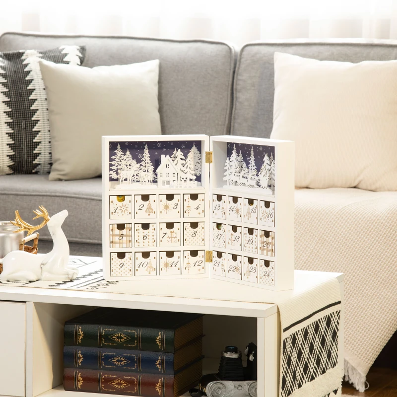 White wooden advent calendar with winter village scene.